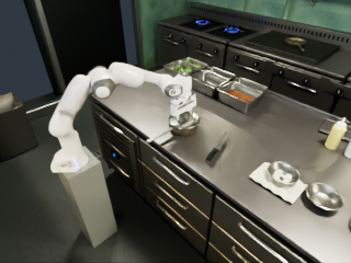 Simulated fixed camera view of the Franka and kitchen station